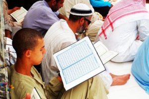 A-young-man-reads-holy-Quran-in-Makkah-masjid